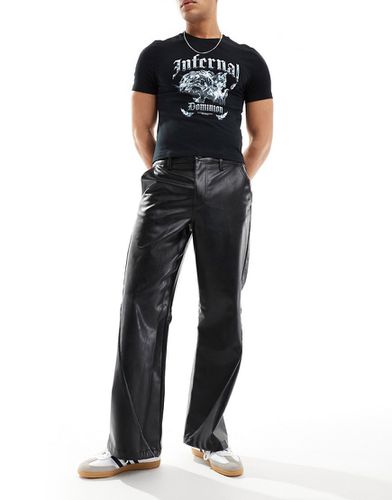 Pantaloni ampi a fondo ampio neri in pelle sintetica con profili sportivi - ASOS DESIGN - Modalova