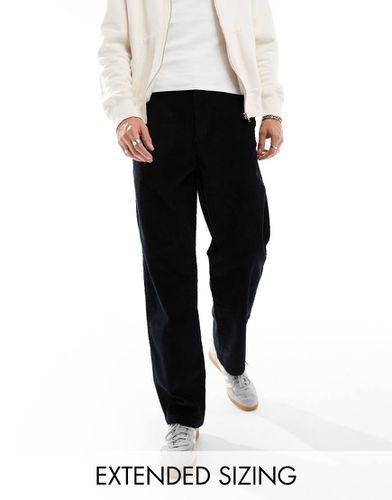 Pantaloni ampi in velluto a coste neri - ASOS DESIGN - Modalova