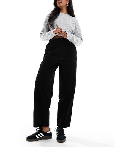 Pantaloni ampi neri in velluto a coste - ASOS DESIGN - Modalova