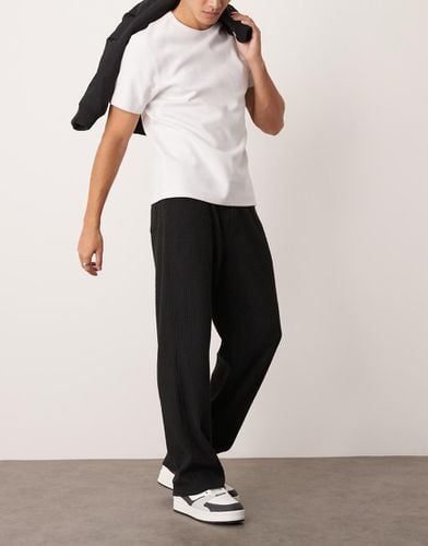 Pantaloni ampi spazzolati a coste color antracite - ASOS DESIGN - Modalova