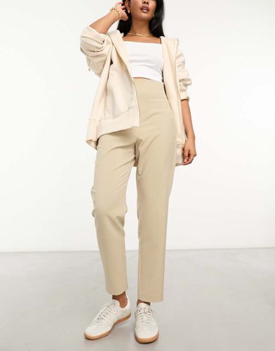 Pantaloni beige con cuciture in vita - ASOS DESIGN - Modalova