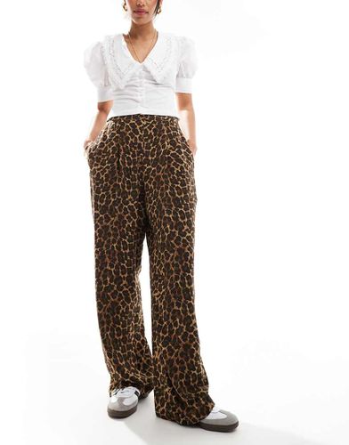 Pantaloni comodi con stampa animalier - ASOS DESIGN - Modalova