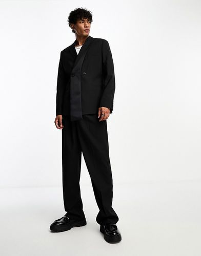 Pantaloni da abito neri a pieghe ampie - ASOS DESIGN - Modalova