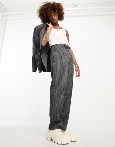 Pantaloni da abito a fondo ampio neri a righe bianche - ASOS DESIGN - Modalova