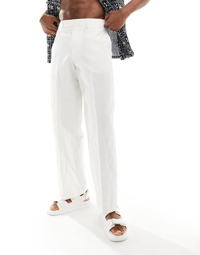 Pantaloni eleganti a fondo ampio bianchi testurizzati - ASOS DESIGN - Modalova