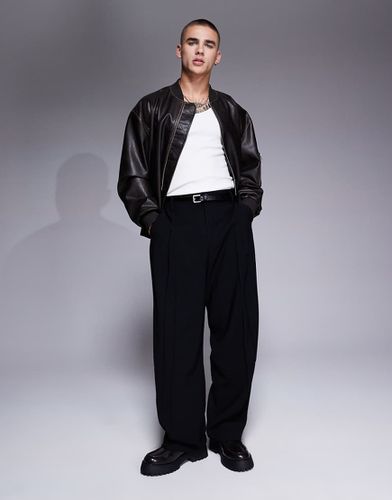 Pantaloni eleganti a fondo ampio neri a pieghe sul davanti - ASOS DESIGN - Modalova