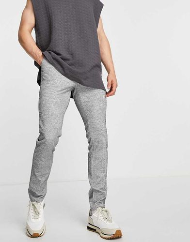 Pantaloni eleganti skinny in jersey a coste con coulisse in vita in coordinato - ASOS DESIGN - Modalova