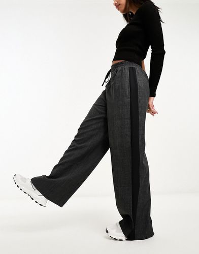 Pantaloni grigi a quadri con pannello a contrasto - ASOS DESIGN - Modalova