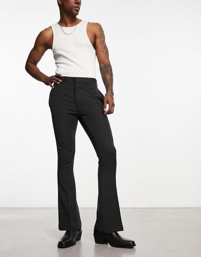 Pantaloni skinny eleganti a zampa neri - ASOS DESIGN - Modalova