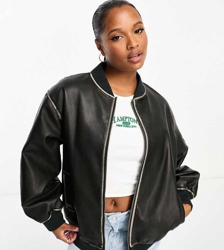 ASOS DESIGN Petite - Giacca bomber nera in pelle sintetica slavata - ASOS Petite - Modalova