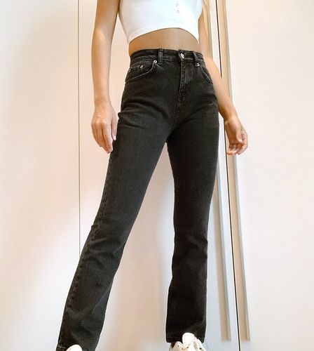 ASOS DESIGN Petite - Jeans a zampa elasticizzati a vita alta anni '70 slavato - ASOS Petite - Modalova