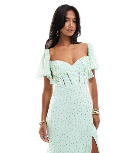 ASOS DESIGN Petite - Vestito lungo in raso a pois con dettaglio stile corsetto in chiffon con taglio sbieco e maniche con volant - ASOS Petite - Modalova