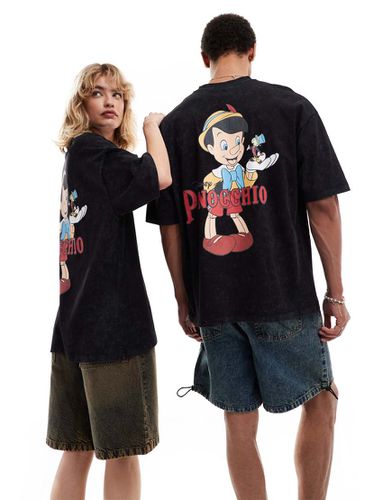 T-shirt unisex slavato con stampa Disney di Pinocchio - ASOS DESIGN - Modalova