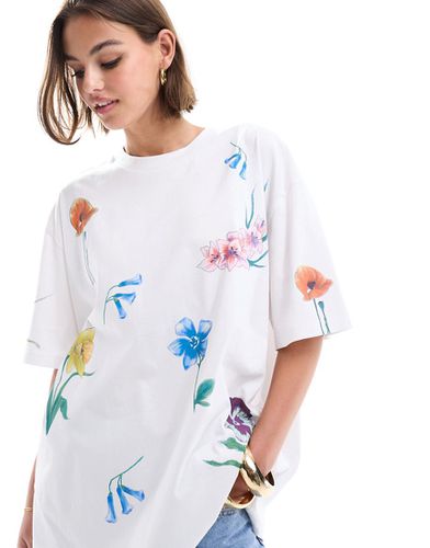 T-shirt boyfriend bianca con grafica a fiori stampata - ASOS DESIGN - Modalova