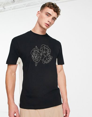 T-shirt comoda nera e bianco sporco color block con stampe combinate - ASOS DESIGN - Modalova