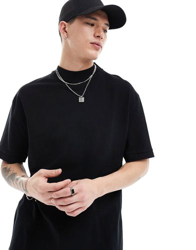 T-shirt girocollo vestibilità comoda in piqué nera a coste - ASOS DESIGN - Modalova