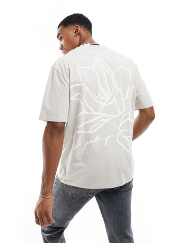 T-shirt grigia con stampa di fiore sul retro - ASOS DESIGN - Modalova