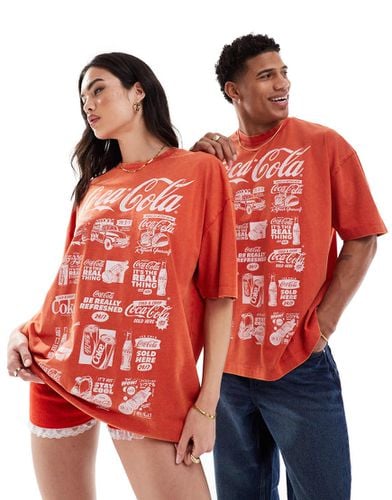 T-shirt oversize unisex slavato con stampa su licenza di Coca-Cola sul davanti - ASOS DESIGN - Modalova