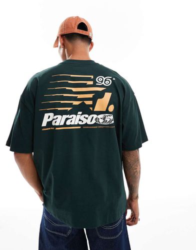 T-shirt oversize scuro con stampa "Paraiso" sul retro - ASOS DESIGN - Modalova