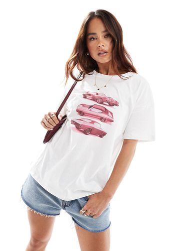 T-shirt oversize avorio con grafica di auto rosa - ASOS DESIGN - Modalova