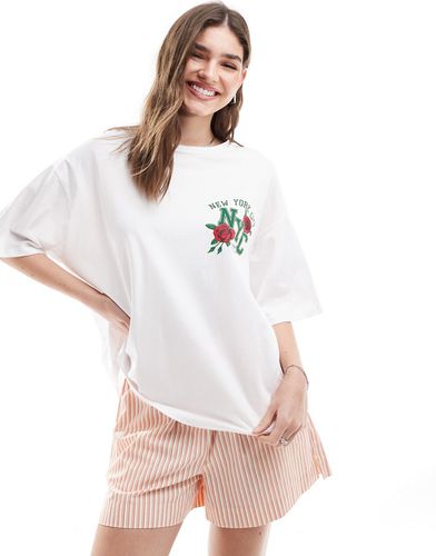 T-shirt oversize bianca con grafica "NYC" con rose - ASOS DESIGN - Modalova