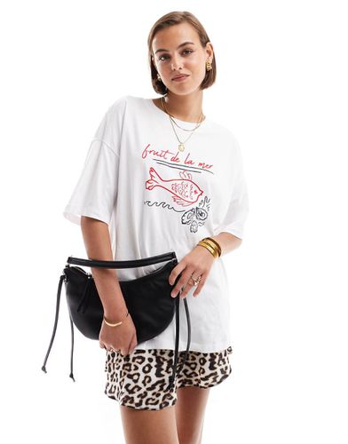 T-shirt oversize bianca con stampa di pesce - ASOS DESIGN - Modalova