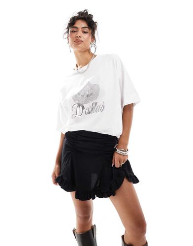 T-shirt oversize color avorio con grafica "Dallas" - ASOS DESIGN - Modalova