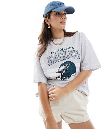 T-shirt oversize color ghiaccio mélange con stampa su licenza "Philadelphia Eagles" - ASOS DESIGN - Modalova