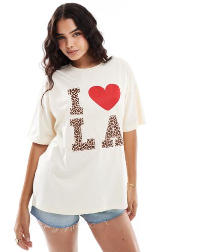 T-shirt oversize nera con numero leopardato applicato - ASOS DESIGN - Modalova