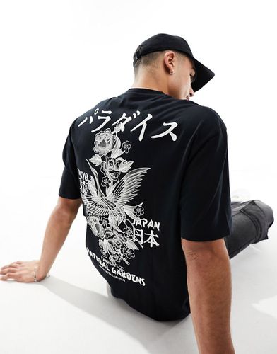T-shirt oversize nera con stampa floreale stile souvenir sul petto e sul retro - ASOS DESIGN - Modalova