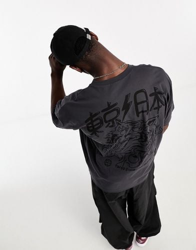 T-shirt oversize slavato con stampa "Tokyo Tiger" sul davanti e sul retro - ASOS DESIGN - Modalova