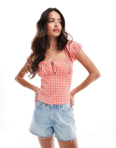 Top milkmaid con stampa a quadretti e laccio sul davanti - ASOS DESIGN - Modalova