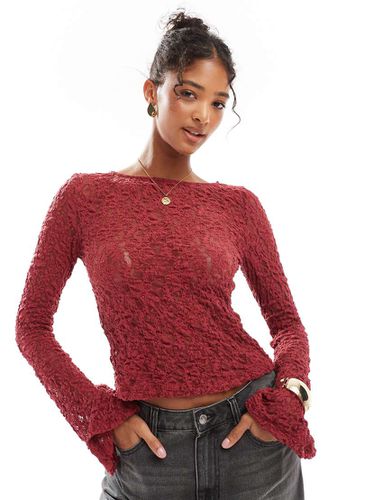 Top a maniche lunghe bordeaux in pizzo con maniche a campana - ASOS DESIGN - Modalova