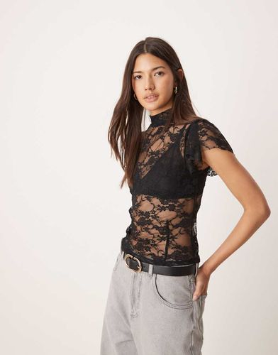 Top accollato in pizzo con maniche a pipistrello e apertura a goccia - ASOS DESIGN - Modalova