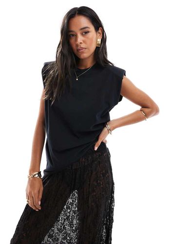 Top senza maniche con spalle imbottite - ASOS DESIGN - Modalova