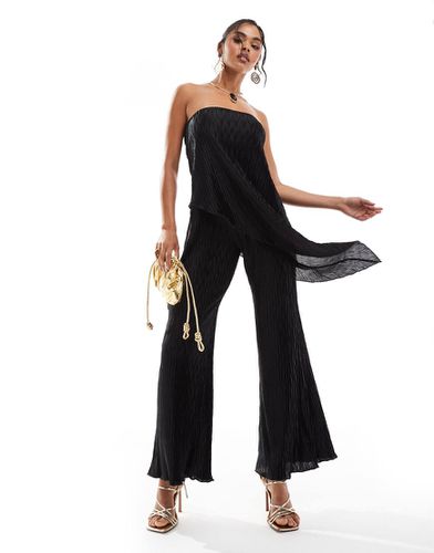 Tuta jumpsuit a fascia nera plissé a fondo ampio - ASOS DESIGN - Modalova