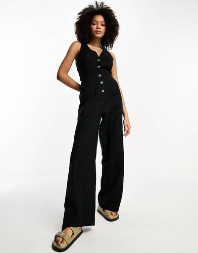 Tuta jumpsuit effetto lino nera con bottoni - ASOS DESIGN - Modalova