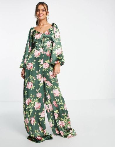 Tuta jumpsuit in raso a fiori allacciata dietro - ASOS DESIGN - Modalova