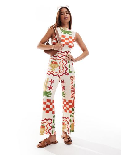 Tuta jumpsuit stampata allacciata dietro con pantaloni culotte, schiena scoperta e scollo a barchetta - ASOS DESIGN - Modalova