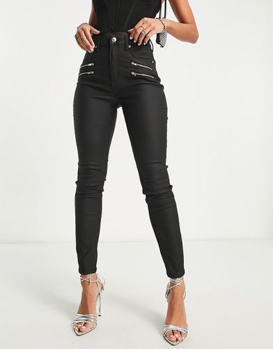 Ultimate - Jeans skinny spalmato con zip - ASOS DESIGN - Modalova