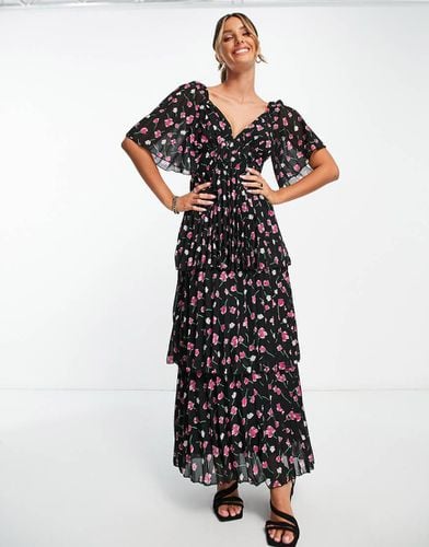 Vestito midi a pieghe con gonna a fasce nero a fiori rosa - ASOS DESIGN - Modalova