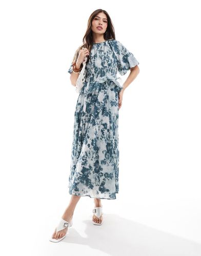 Vestito midi blu con stampa a fiori e maniche a sbuffo arricciato in vita - ASOS DESIGN - Modalova