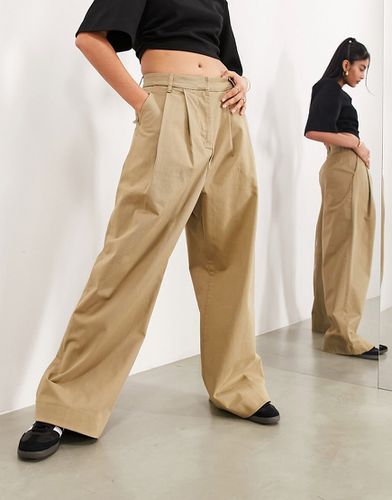 Pantaloni comodi a fondo ampio in twill di cotone color pietra - ASOS EDITION - Modalova