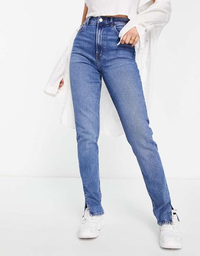 Jeans dritti medio con spacco sul fondo - Bershka - Modalova