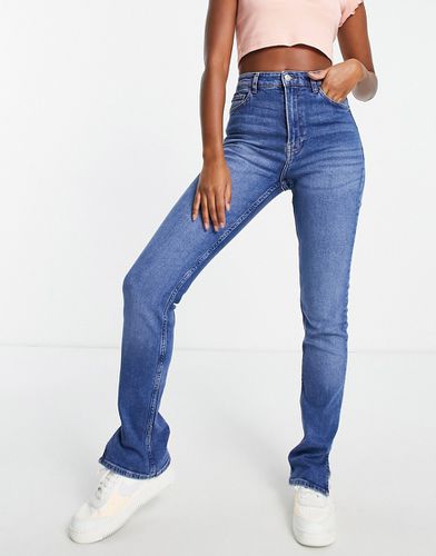 Jeans dritti medio con spacco sul fondo - Bershka - Modalova