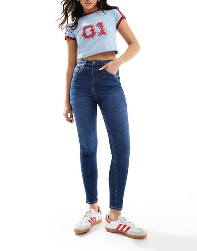 Jeans skinny a vita alta alla caviglia medio - Bershka - Modalova