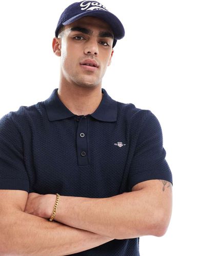 Polo in maglia di cotone strutturata con logo ricamato a scudo - Gant - Modalova