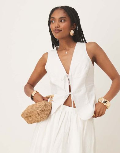 Débardeur façon gilet de tailleur en lin noué devant - Gina Tricot - Modalova