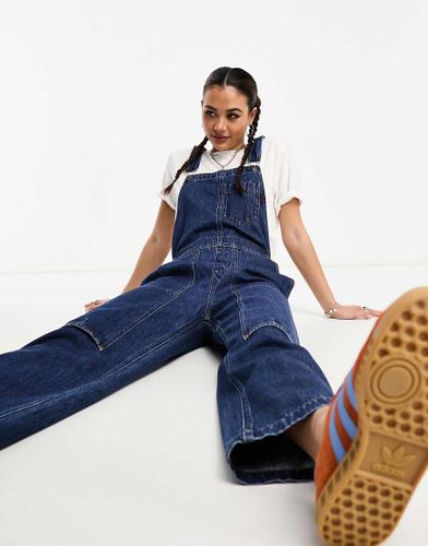 Salopette in denim lavaggio medio - Gramicci - Modalova