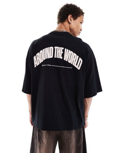 Dr. Denim - Curtis - T-shirt nera oversize con grafica "Around The World" rosa stampata sul retro - Dr Denim - Modalova